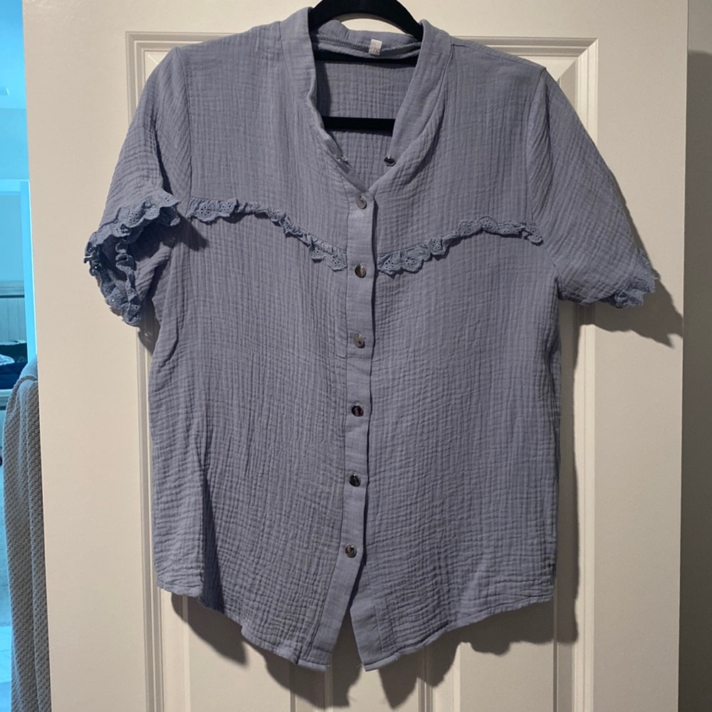 Blue summer top with floral ruffle